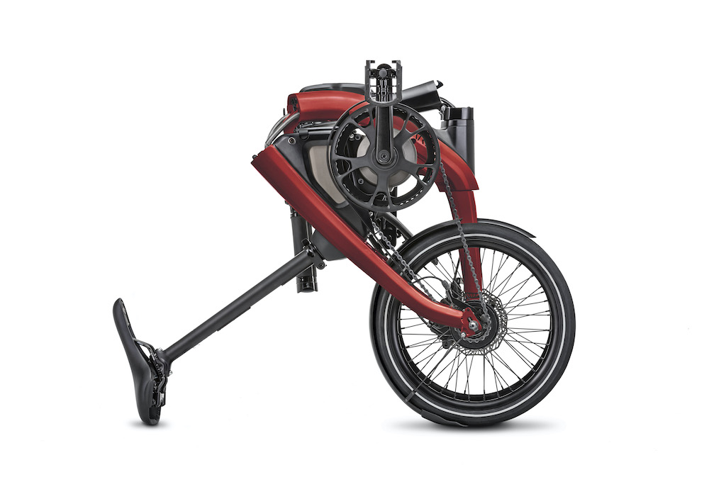 The ARĪV Merge folds easily, allowing customers to conveniently roll the bike on its two wheels while folded.
